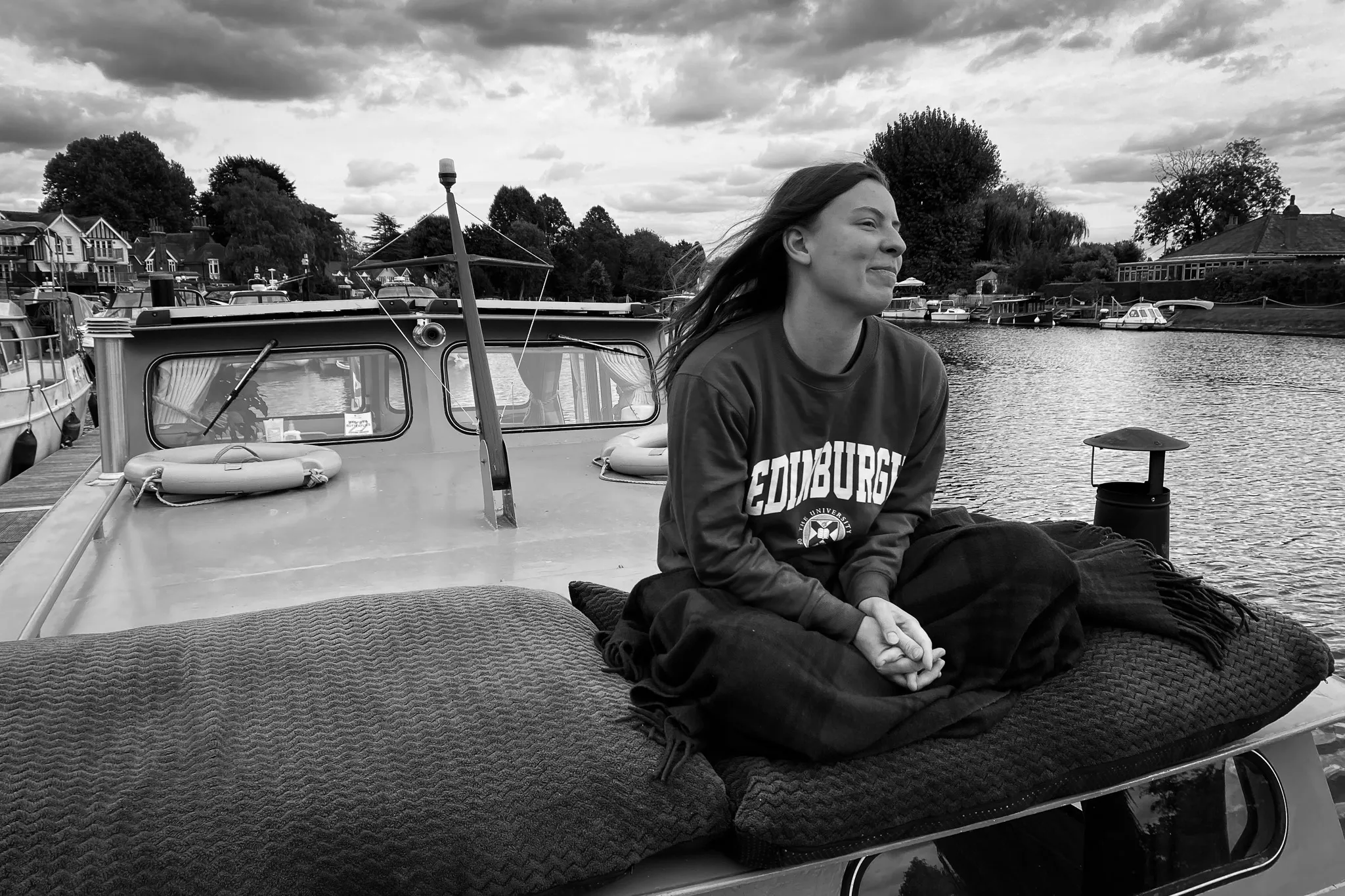 Erin sits on a house boat in Bourne End, UK